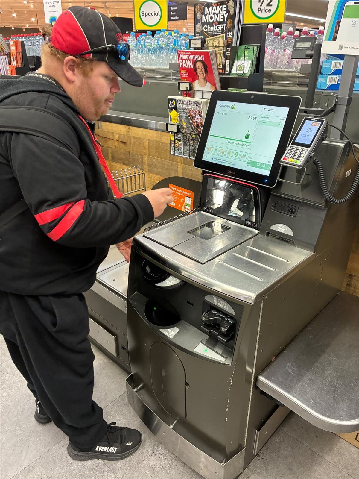 A Yours Truly participant using the self-serve checkout at the shops